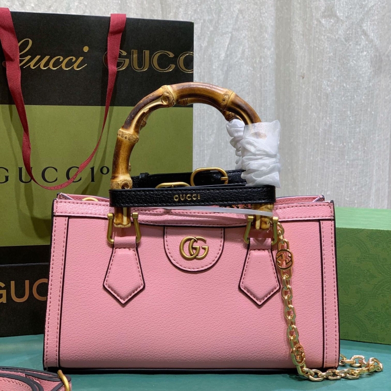 G*u*i top handle bags